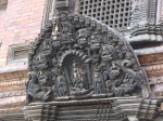 Intricate carving of Hindu deities over a door... note the paint still visible on some figures